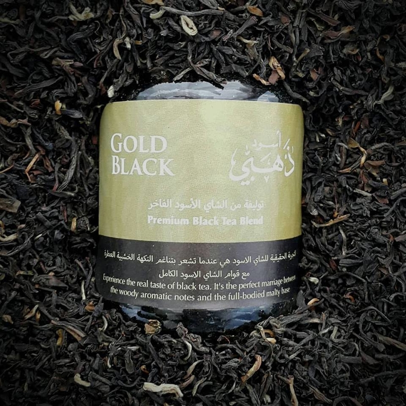 ذهبي أسود